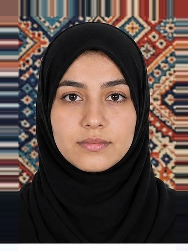 Rejected DV photo: busy patterned background behind the applicant